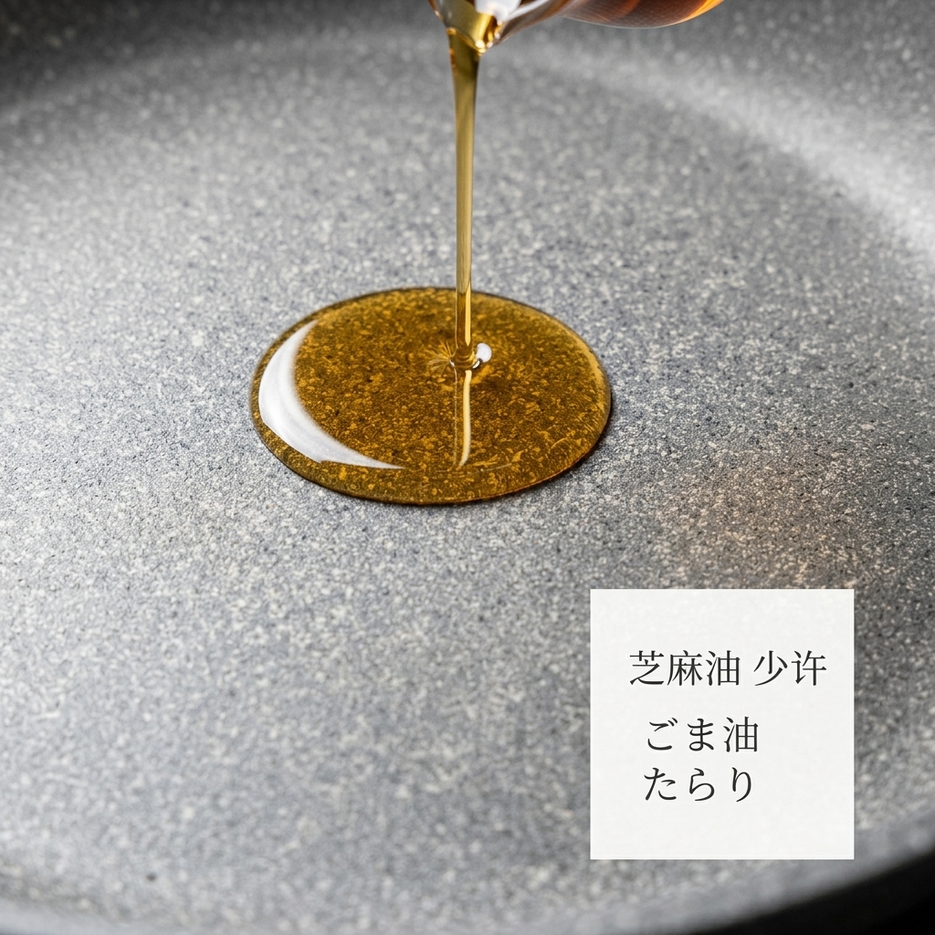 Ground pork being browned in a pan with garlic and ginger in sesame oil.