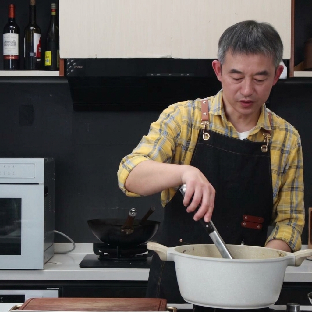 A pair of stainless steel tongs lifting boiled pork ribs out of a large cooking pot.