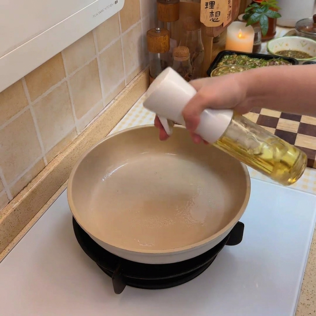 Sliced cabbage cooking in a pan.