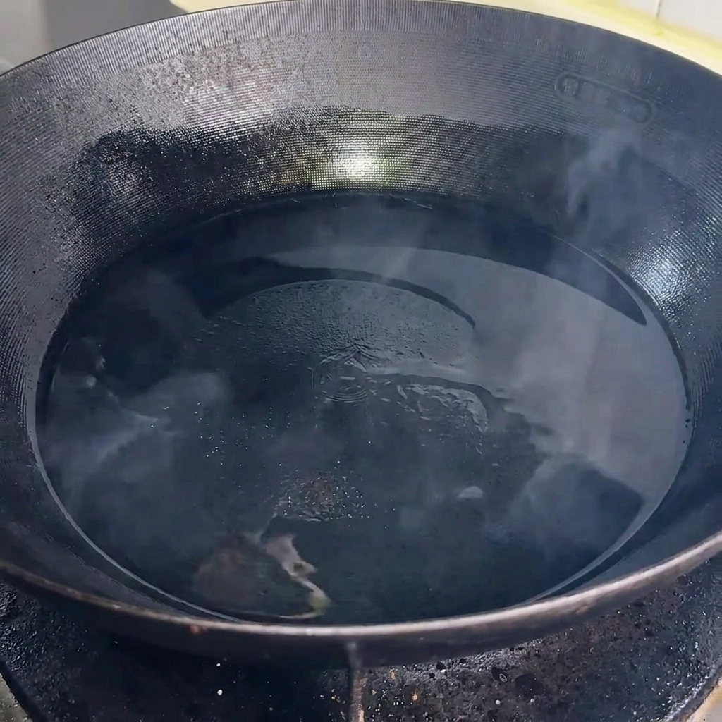Slices of Spam sizzling in a hot cast-iron pan, developing a deep brown, crispy crust.