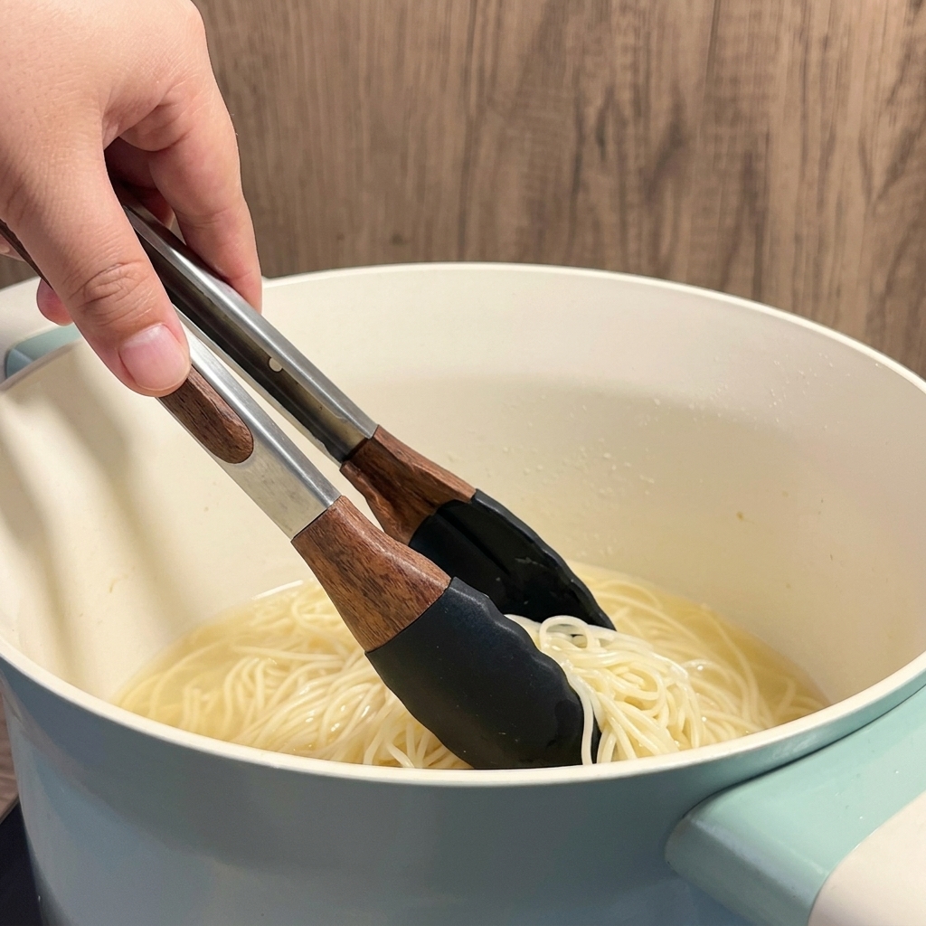 Dry ramen noodles submerged in boiling water within a white pot.