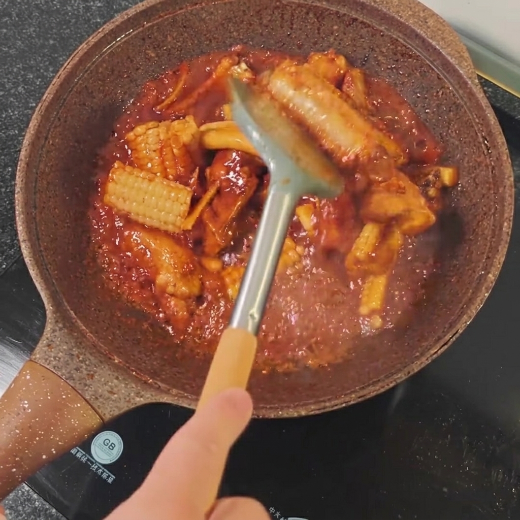 The pan uncovered while cooking to allow the sauce to thicken into a glaze.