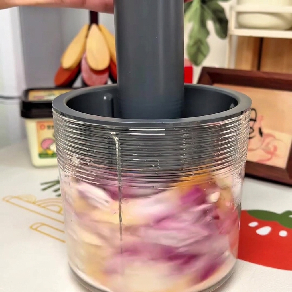 Coarsely processed mixture of apple, pear, and onion in a food processor.