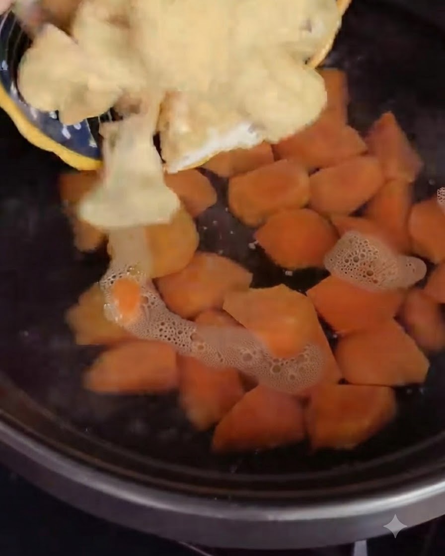 Fried tofu puffs being added to the cooking pot.