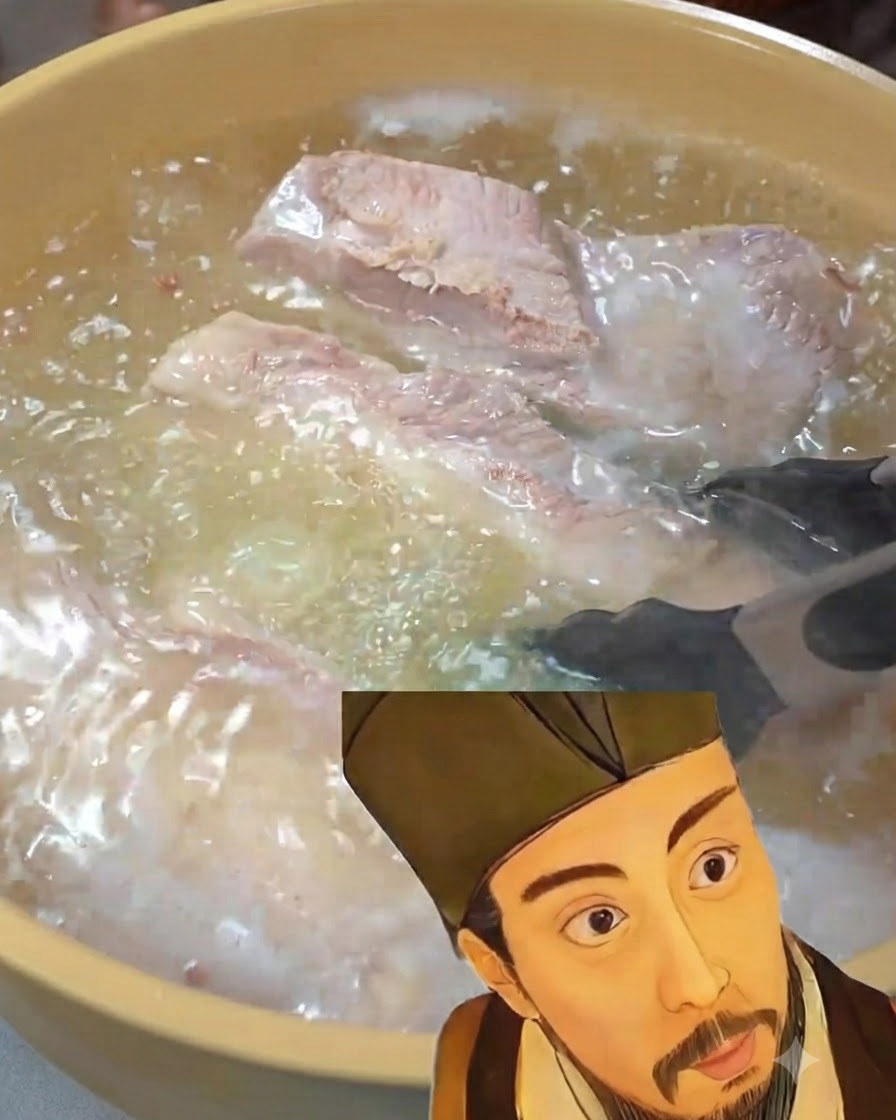 Pork belly strips boiling inside a pot with ginger and scallions.