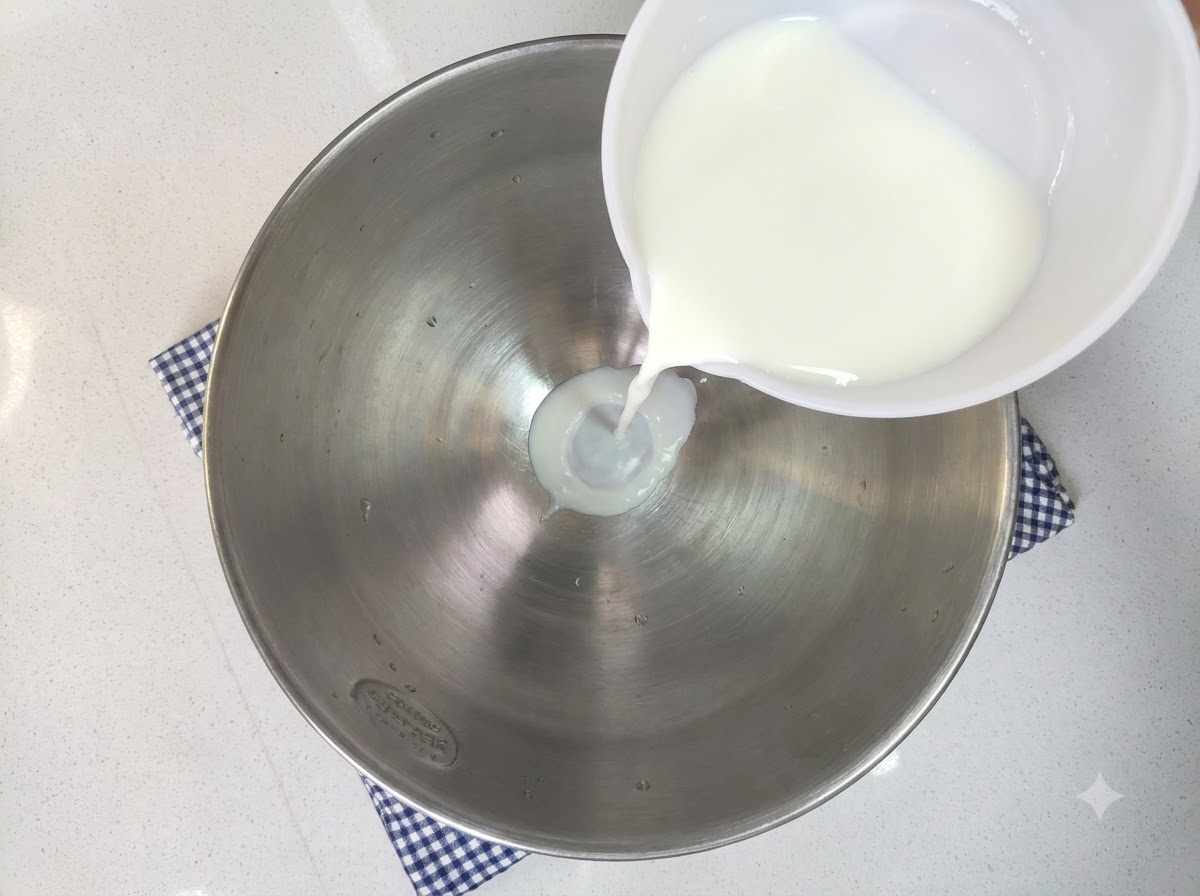 Milk, white sugar, yeast, egg, and high-gluten flour being poured into a large mixing bowl.