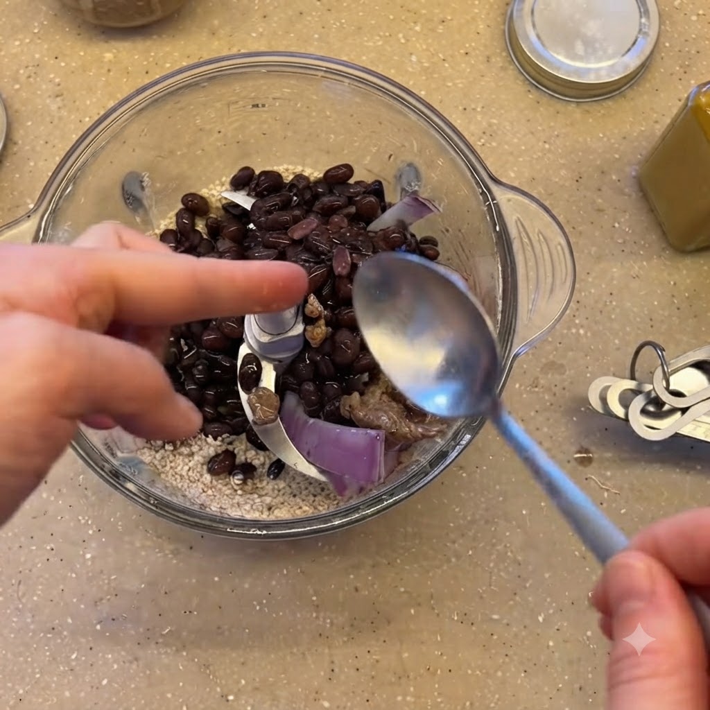 A spoonful of flaxseed meal being added to the preparation bowl.