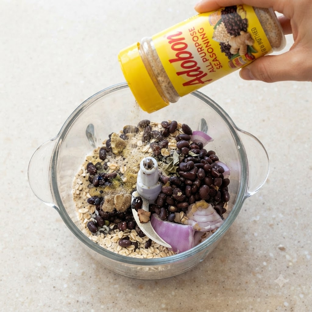 White miso paste being scooped and added into the blender with other ingredients.