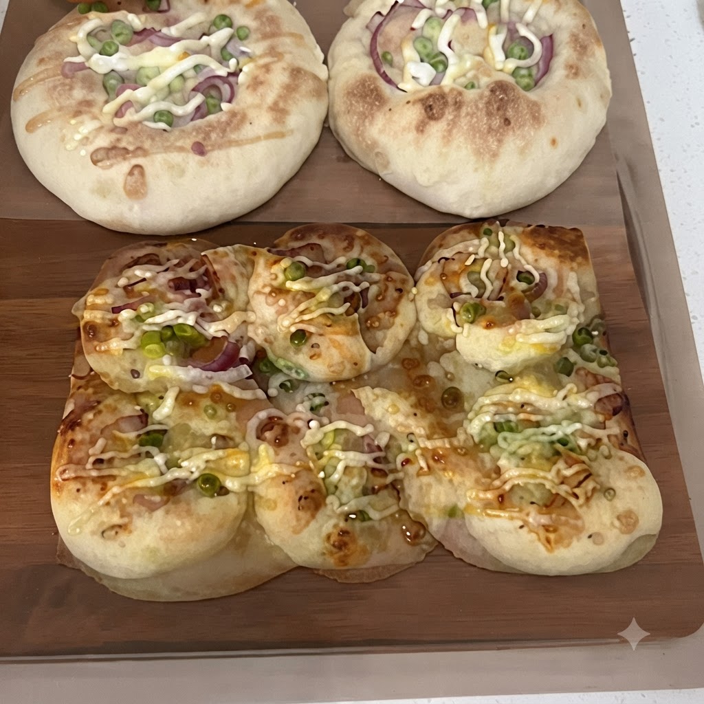 Slices of bacon being arranged inside the center wells of the dough pieces.