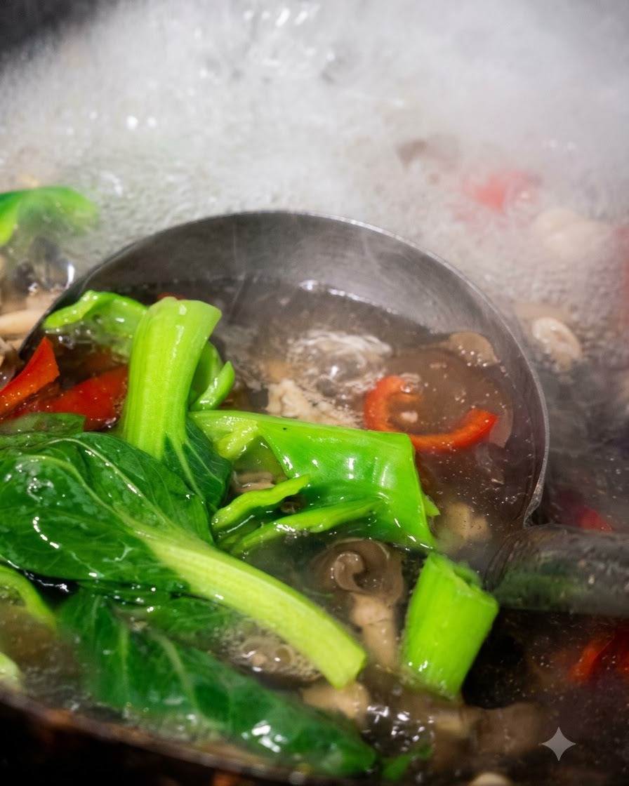 A ladle scooping out cooked bok choy, peppers, and mushrooms from boiling water.