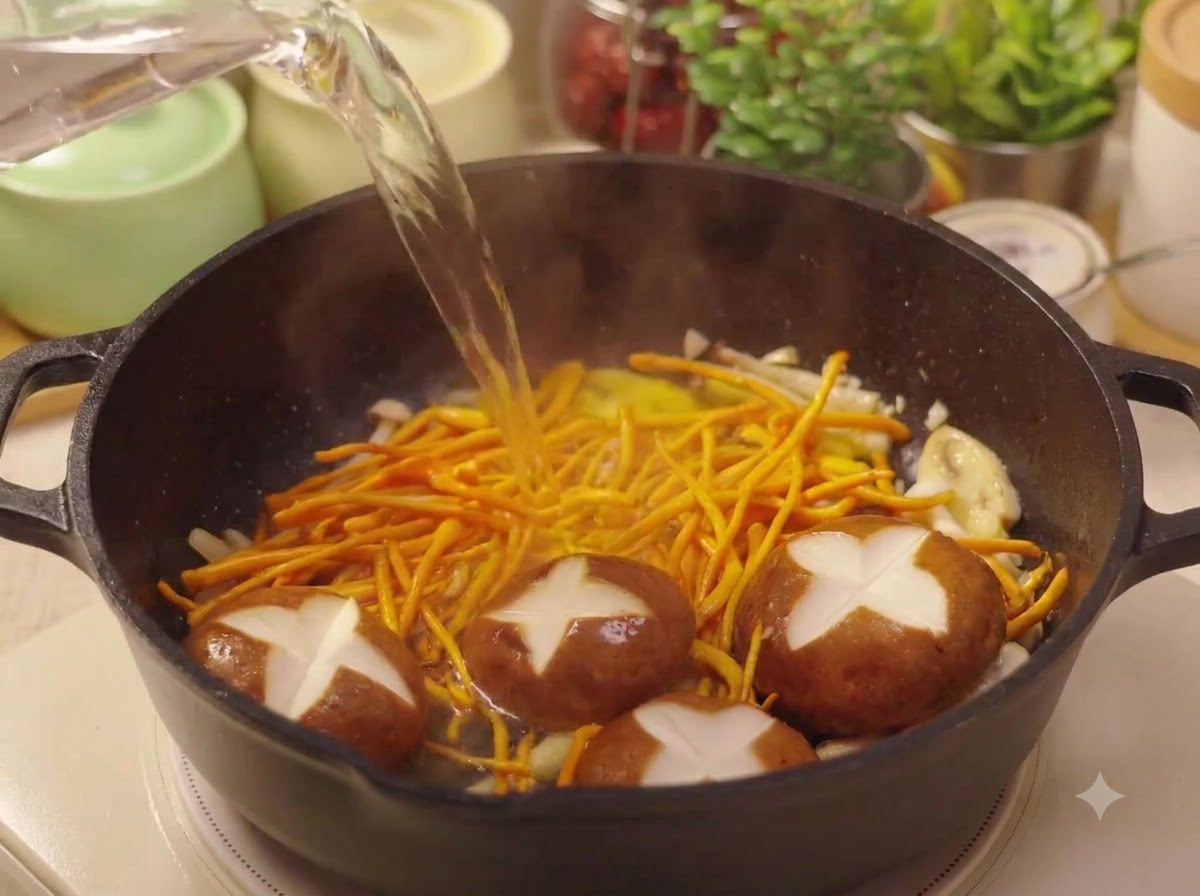 Water being poured from a pitcher into a skillet filled with mushrooms and cordyceps flowers.