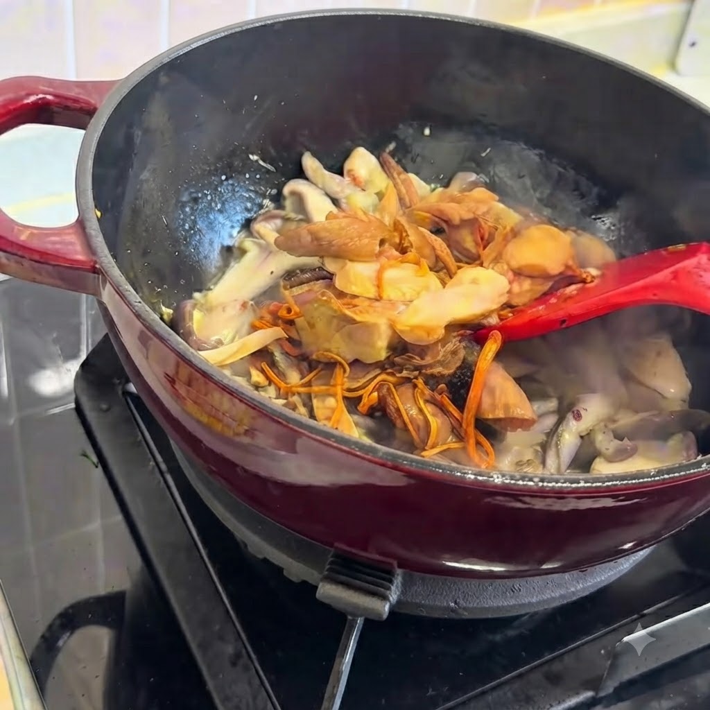 Rehydrated mushrooms mixed with fresh mushrooms in the cooking pot.