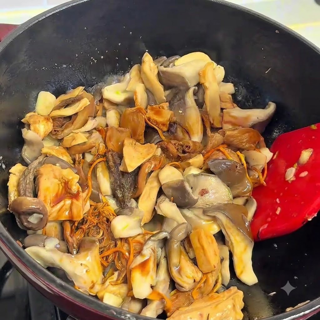 Seasoned mushrooms cooking in the pan.