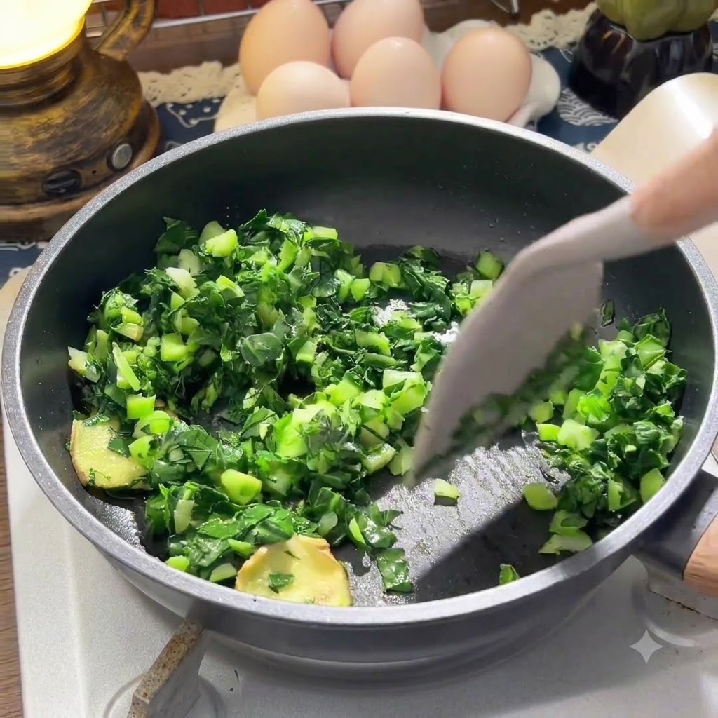 Cooked white rice being mixed into the pan with greens and ginger.