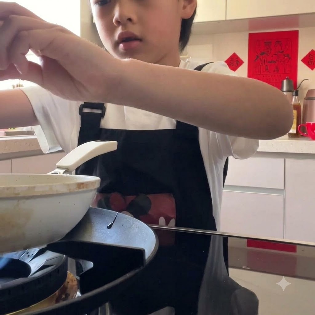 An egg being cracked into a pan on the stove to be fried.