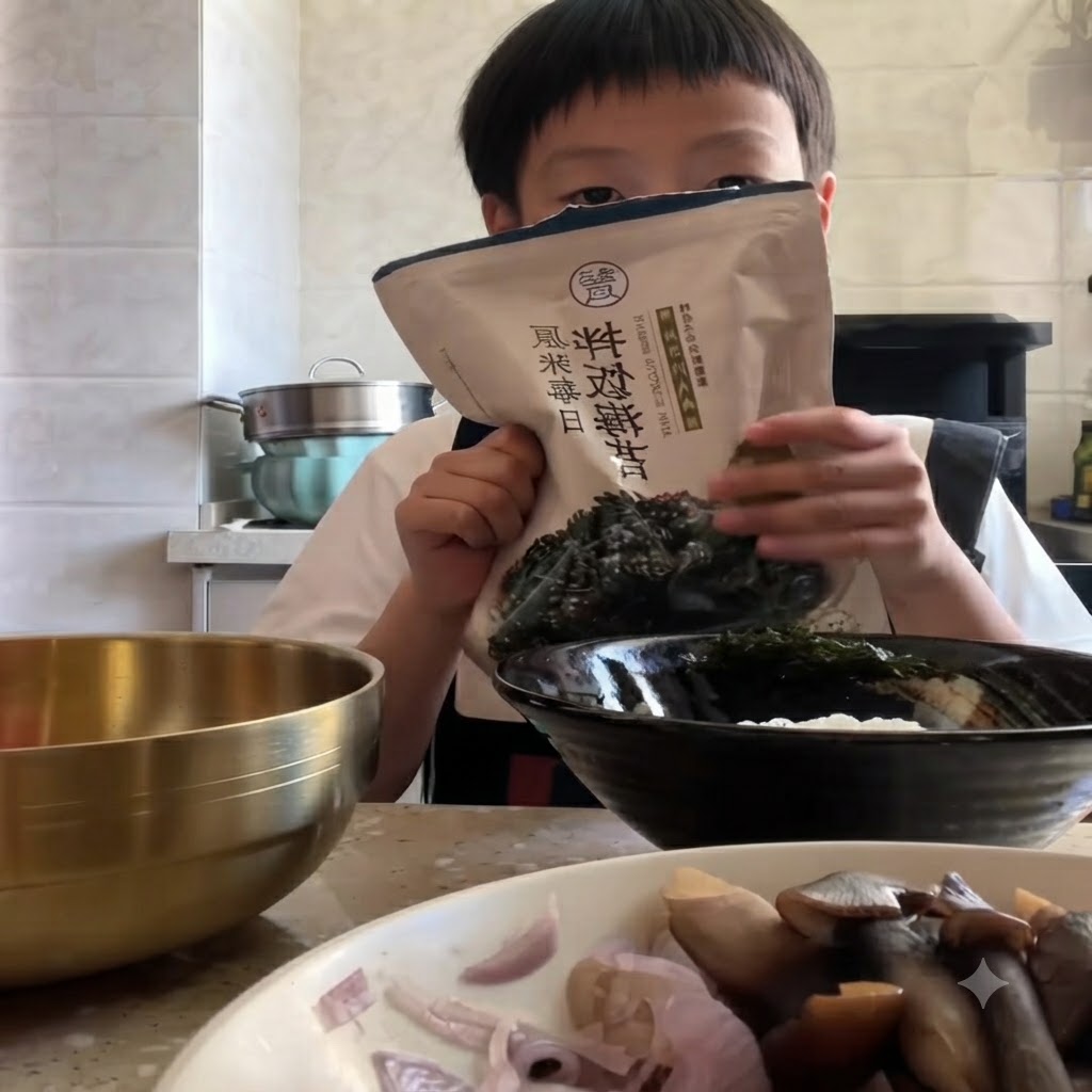 A person pouring crushed seaweed flakes from a pouch into a black bowl containing white rice.